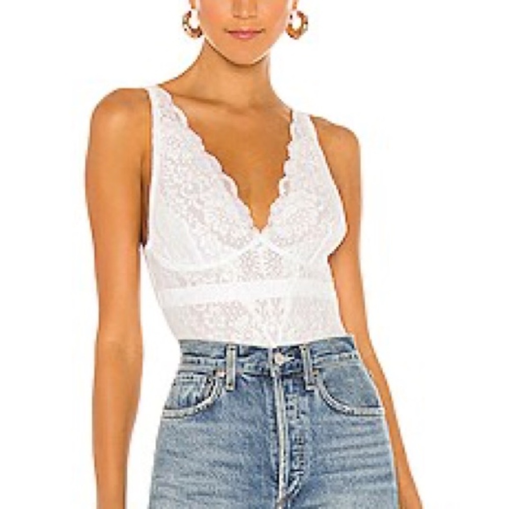 HAH Lady N W8ing Bodysuit in
Blanc From Revolve